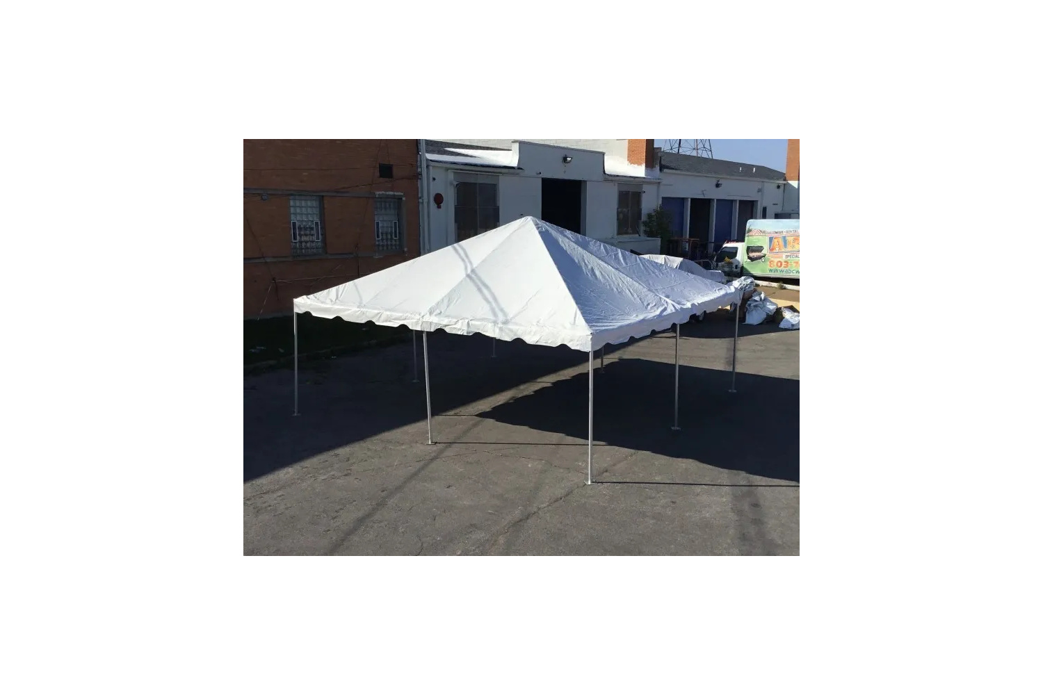 20x20 white frame tent rental on asphalt surface for markets and vendor booths in Winnipeg