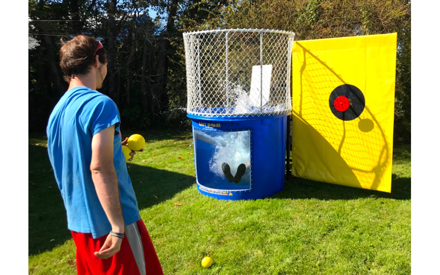 Dunk tank water game rental for outdoor parties and fundraisers in Winnipeg Manitoba