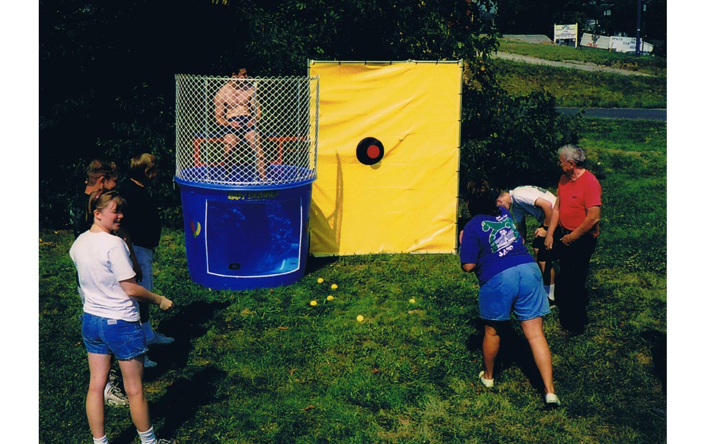 Jump Up Bouncers dunk tank game rental for kids parties in Winnipeg and Kenora
