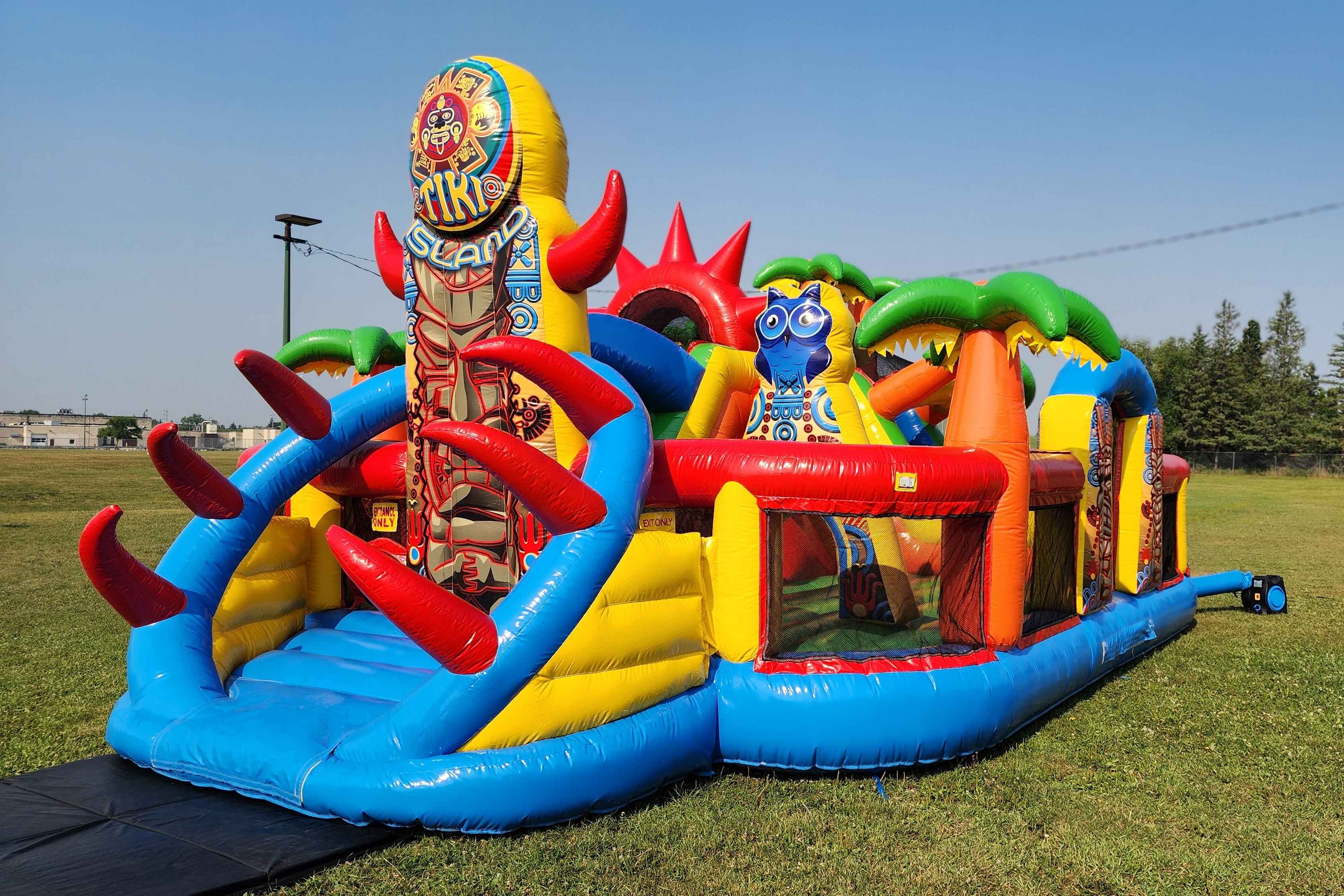 Tiki Island Mega Playground inflatable bouncer rental in Winnipeg Manitoba by Jump Up Bouncers